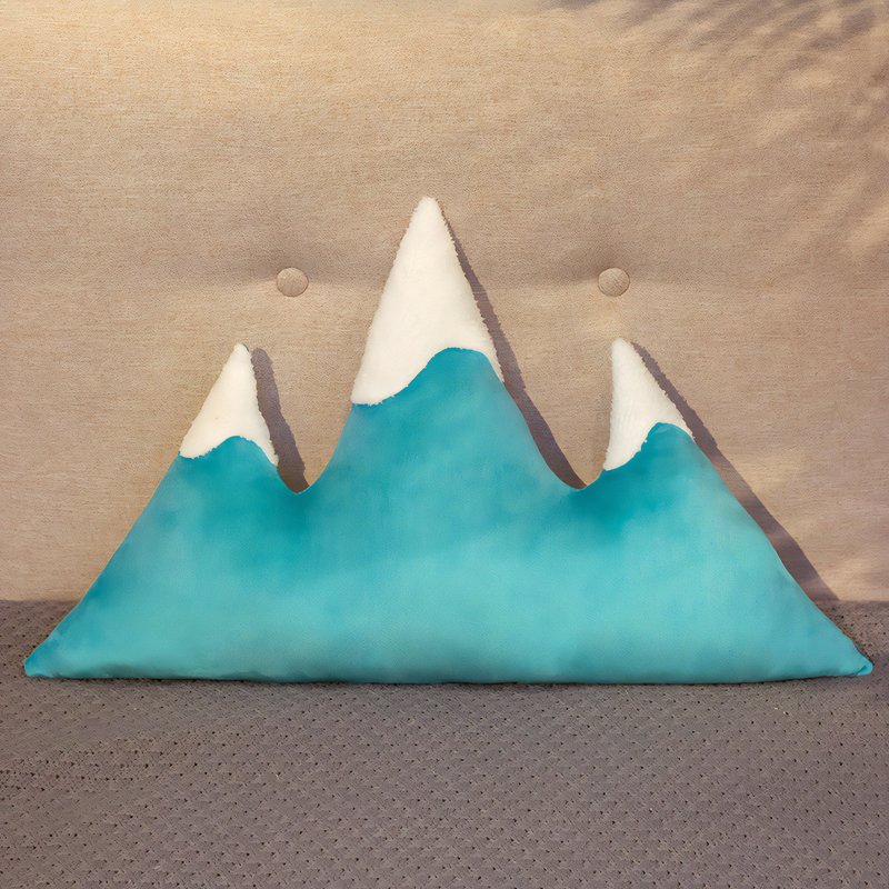 Coussin montagne bleu avec les sommets de la montagne de couleur blanche