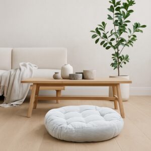 Coussin rond vert à rayures